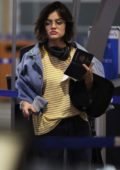 Lucy Hale catches an early morning flight out of Vancouver, Canada