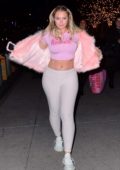 Iskra Lawrence heads to dinner in pink crop top and pink fur coat in New York City