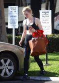 Elle Fanning grabs a ride after her workout at LA Fitness in Beverly Hills, Los Angeles