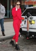 Gigi Hadid steps out in a red sweatsuit in New York City