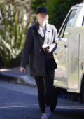 Emma Stone gives a smile while out on a stroll in Los Angeles