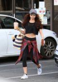 Sarah Hyland grabs an iced coffee after hitting the the gym in Los Angeles