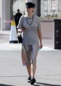 Jennifer Lawrence spotted in a grey top and satin skirt and black hat while out for a meeting in Westwood, California