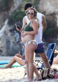 Hilary Duff spotted in a bikini while enjoying a relaxing day at the beach with boyfriend Matthew Koma in Malibu, California