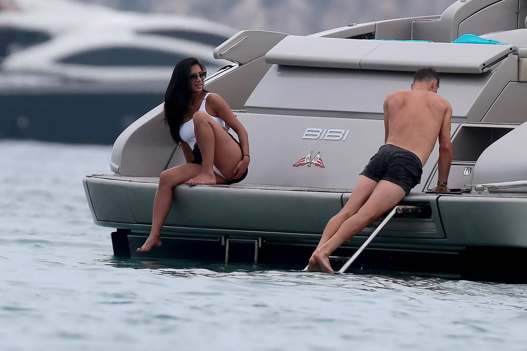 nicole scherzinger spotted in a white bikini while enjoying a day with boyf...