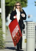 Suki Waterhouse spotted carrying around an 'Assassination Nation' Cutout in Los Angeles