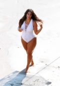 Ashley Graham seen wearing multiple swimsuits and bikini during her clothing line photoshoot at the beach in Malibu, California
