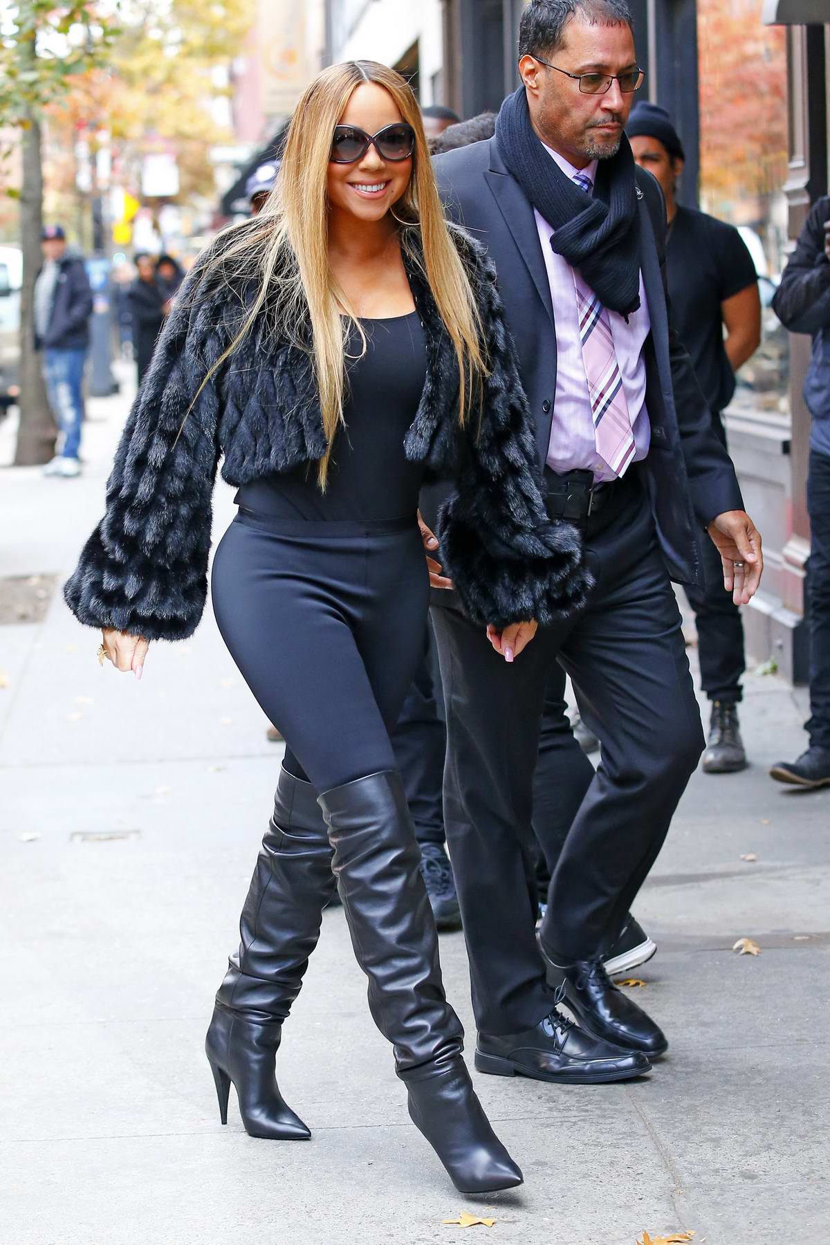 Mariah Carey Gets Edgy in Block Heel Ankle Boots & Leather Leggings –  Footwear News