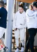 Thylane Blondeau steps out with friends wearing a white hoodie and sweatpants in Los Angeles