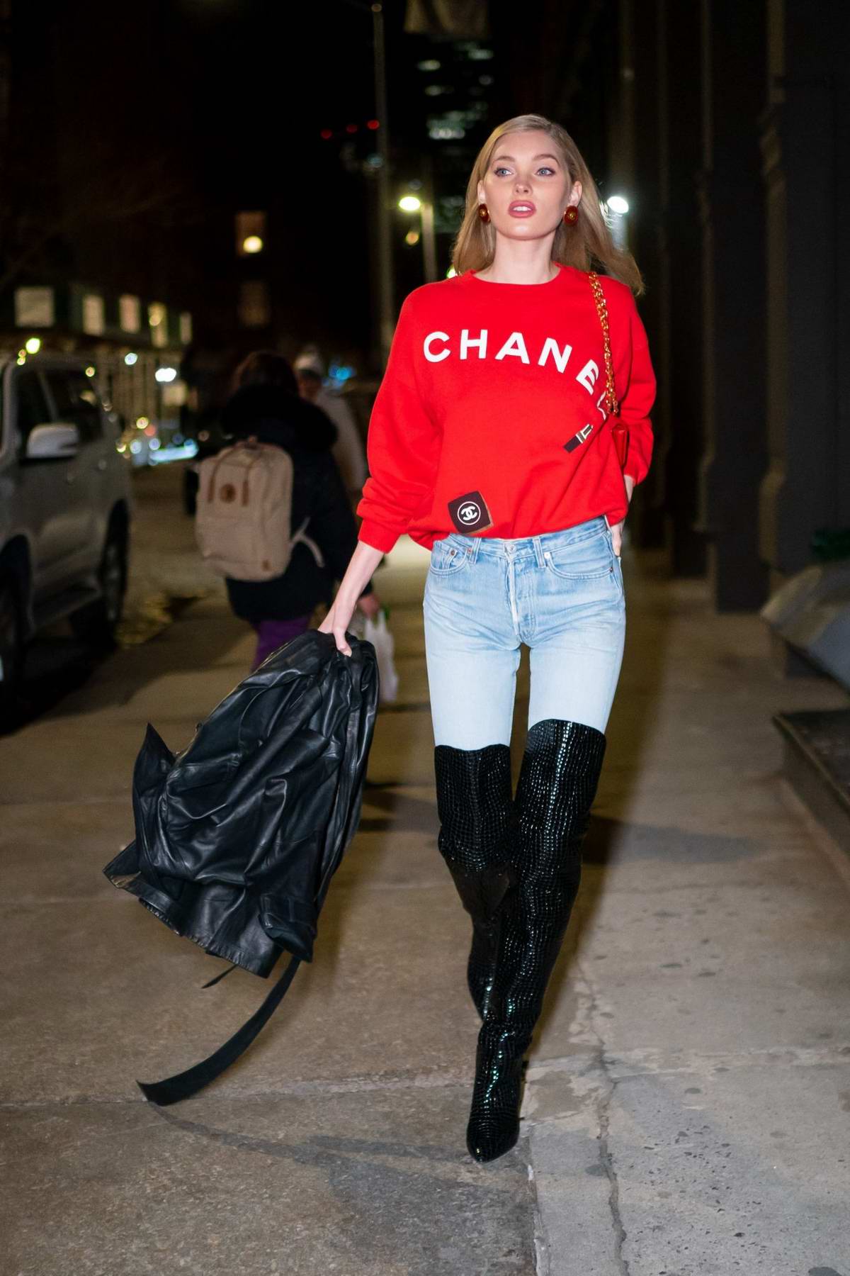 elsa hosk keeps it stylish with a red chanel sweater, jeans and black thigh  high boots while out and about in soho, new york city-130219_7