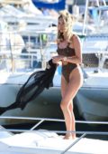 Megan McKenna spotted in an animal print swimsuit enjoys the sun on a boat in Tenerife, Spain
