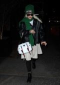 Rita Ora bundles up in a black leather jacket with knitted green scarf and hat while out in New York City