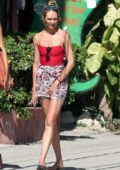 Candice Swanepoel steps out for stroll in a red top and a beach skirt in Tulum, Mexico