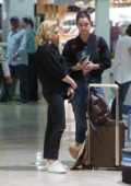 Chloe Grace Moretz and Kate Harrison take selfies with fans at the airport in Puerto Vallarta, Mexico
