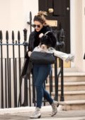Katharine McPhee wore a black fur coat, jeans and snakeskin boots during a day of shopping in London, UK