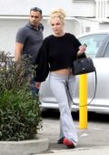 Britney Spears keeps it casual in a black sweater and grey sweatpants during a visit to a Tan salon in Thousand Oaks, California