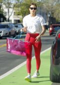 Irina Shayk rocks a Nike top and red leggings while visiting a massage parlor in Brentwood, Los Angeles