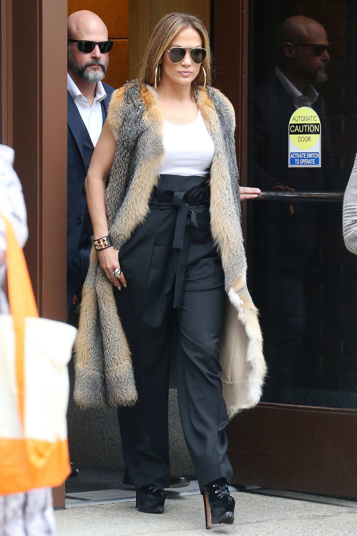 Jennifer Lopez Looks Stylish In An Animal Print Fur Vest As She Leaves 733