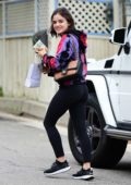 Lucy Hale wears a smile with a colorful tie-dye hoodie and black leggings while out shopping in Studio City, Los Angeles