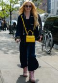 Kathryn Newton smiles for the camera while out in Manhattan, New York City