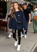 Madison Beer dons a Nike sweatshirt, PVC pants with Off-White Jordan 1 sneakers as she steps out in New York City