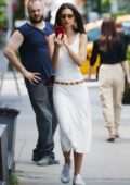 Emily Ratajkowski seen wearing a white tank dress while strolling around SoHo, New York City
