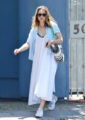 Rachel McAdams seen wearing a white summer dress during a coffee run in Los Angeles