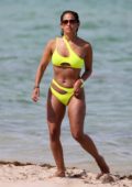 Rocsi Diaz stuns in a neon green bikini as she enjoys a day at the beach in Miami, Florida