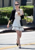 Emma Roberts steps out in a chic pleated polka dot dress for lunch with stylist Brit Elkin in Los Angeles