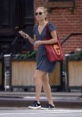 AnnaSophia Robb keeps it casual in a floral summer dress and sneakers while out in New York City