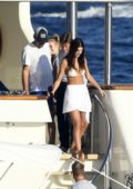 Camila Morrone spotted in a white bikini top on a yacht as she continues her vacation with Leonardo DiCaprio in Sardinia, Italy