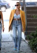Hailey Baldwin rocks an oversized yellow blazer while out with her stylist in West Hollywood, Los Angeles