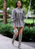 Olivia Culpo looks stylish in an Andamane dress with Paris Texas boots as she steps out in Tribeca, New York City