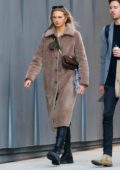 Romee Strijd bundles up in a cozy brown coat while out for a stroll with Laurens van Leeuwen in New York City