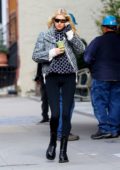 Elsa Hosk looks stylish in a Dior jacket with patterned sweater and leggings while out for a healthy drink in New York City