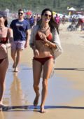 Alessandra Ambrosio rocks burnt orange bikini as she enjoys a beach day with Nicolo Oddi and friends in Florianópolis, Brazil