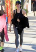 Ashley Greene looks fit in a tank top and leggings as she leaves her yoga class in Studio City, California