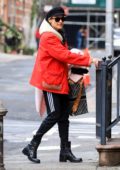 Diane Kruger spotted in a black sailor cap and orange jacket as she steps out in New York City