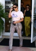 Kim Kardashian shows off her curves as she steps out for shopping with Kourtney Kardashian in Miami, Florida