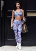 Alexandra Cane wears a colorful patterned sports bra and leggings while stepping out in London, UK