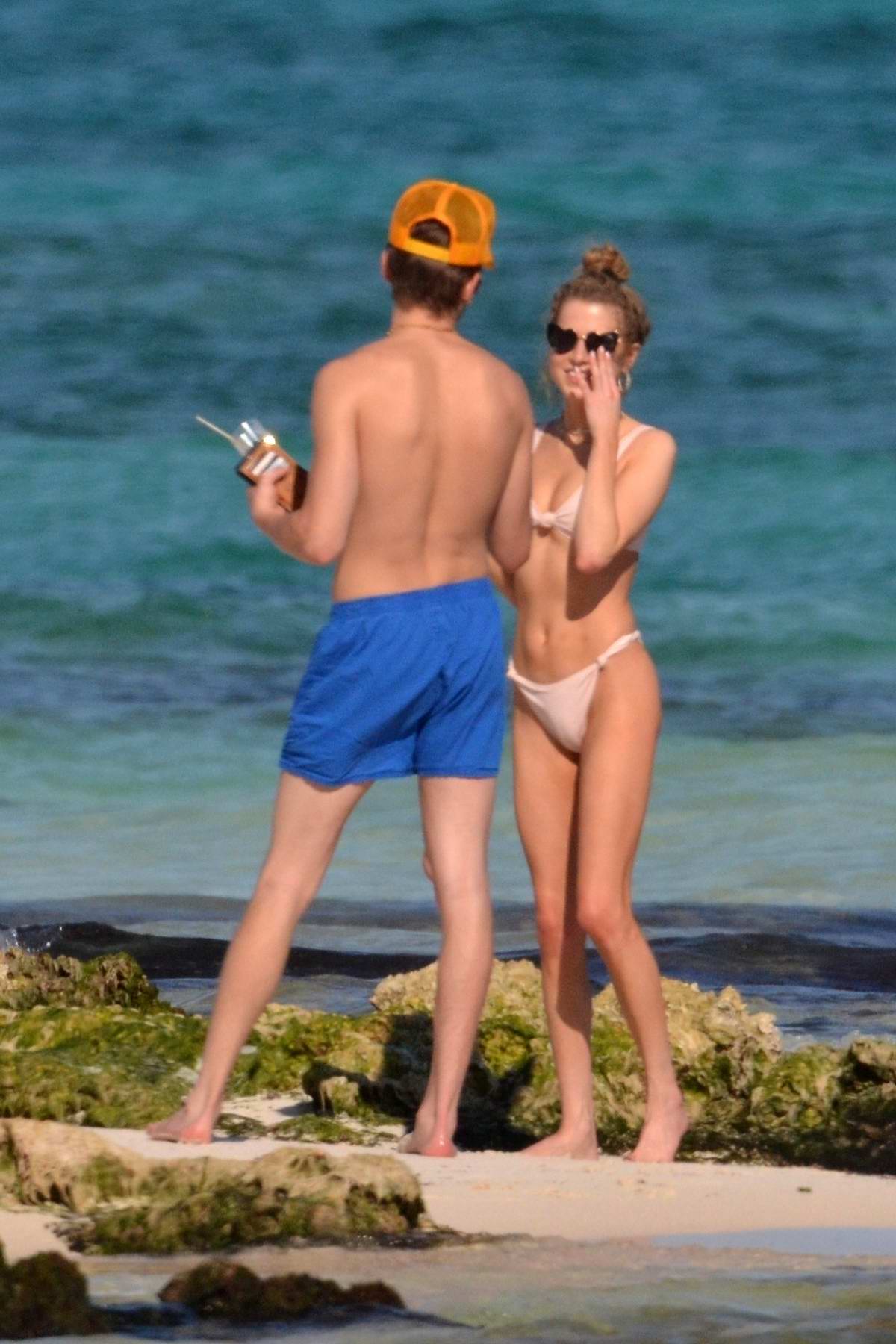 Anne Winters seen wearing a light pink bikini while enjoying the beach with boyfriend Taylor Beau in Tulum, Mexico