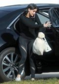Ariel Winter sports a black top and leggings as she returns home after running errands in Los Angeles
