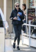 Charlize Theron wears a jacket and leggings as she heads to another meditation class in Beverly Hills, California