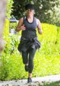 Reese Whiterspoon keeps up with her daily routine as she goes for a run in Brentwood, California