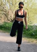 Yazmin Oukhellou gets her morning workout at a local park near her house in Essex, UK