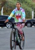 Lais Ribeiro spotted in a colorful tie-dye hoodie while out riding a bicycle with fiance Joakim Noah in Malibu, California