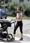 Troian Bellisario steps out for a walk with her baby in Los Angeles