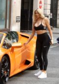 Chloe Ferry flaunts her curves in all-black activewear as she gets into a bright orange Lamborghini Gallardo in London, UK