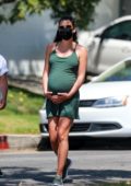 Lea Michele holds her growing belly while out on stroll with her mother in Santa Monica, California