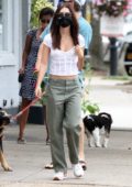 Emily Ratajkowski and Sebarstian Bear-McClard step out to walk their dog after having lunch in Sag Harbor, New York